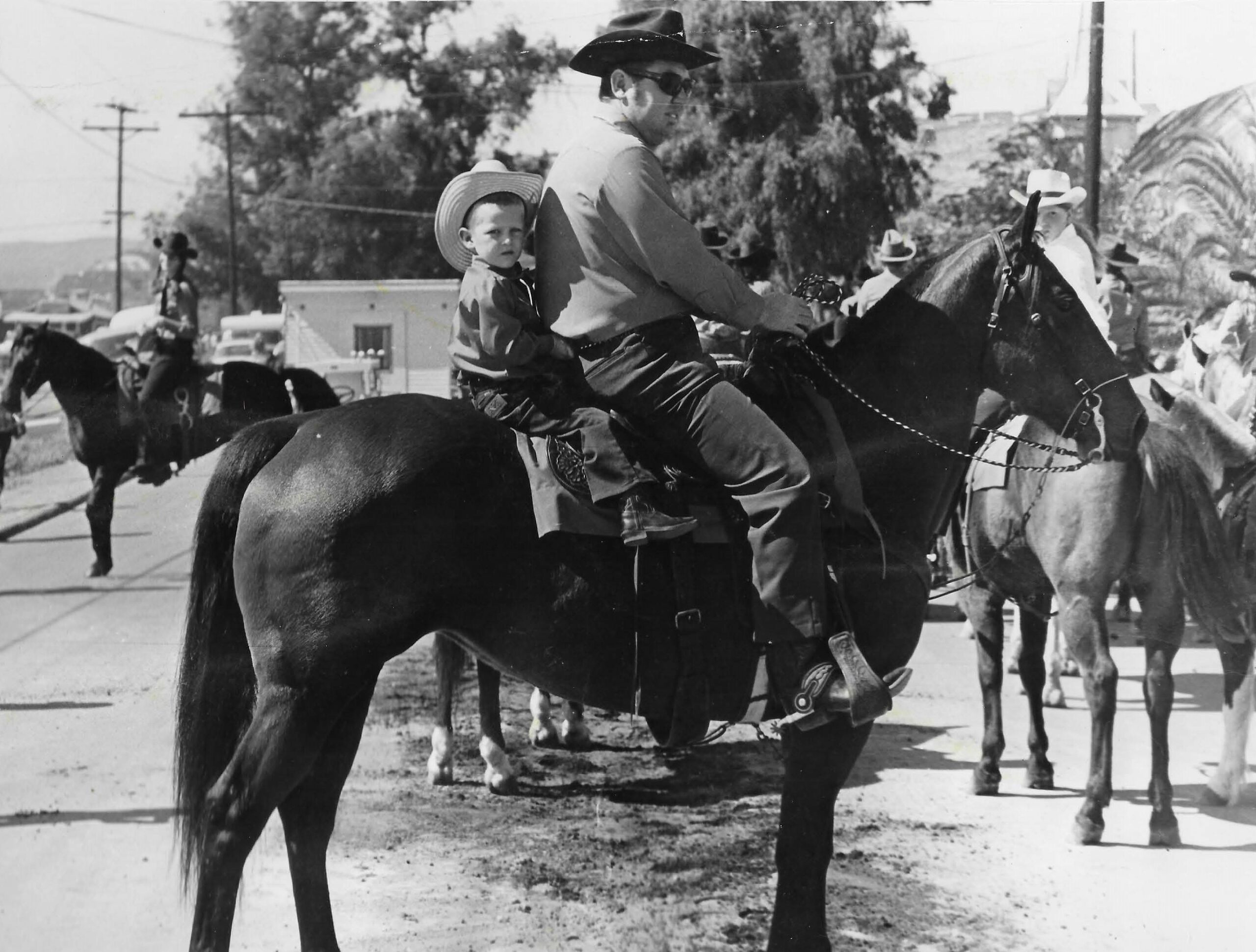 Two Kids in Awe Watching the Rodeo